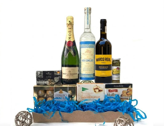Canasta Corporativa con Moët Chandon, Mezcal 400 Conejos y Vino Tinto Clos Montblanc Regalo de Lujo