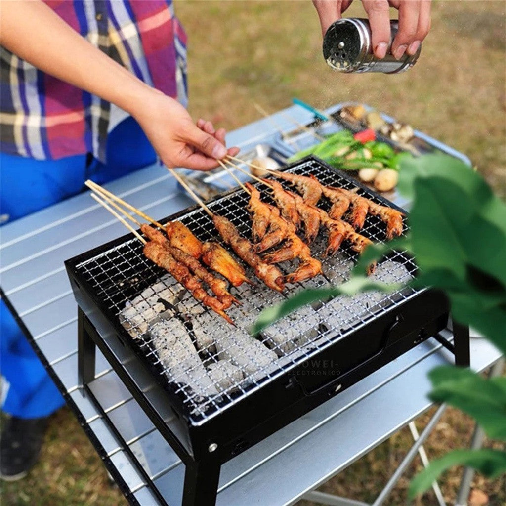 🥩Asador de Carbón Portátil para Viajes🥩