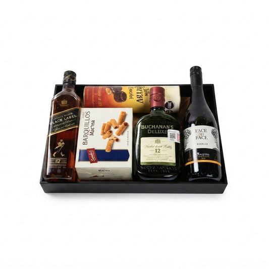 Canasta de Lujo con Whisky y Delicias – Black Label, Buchanan’s Deluxe, Vino Face to Face, Chocolates Turin y Galletas de Mantequilla| Premium/ Exclusivo
